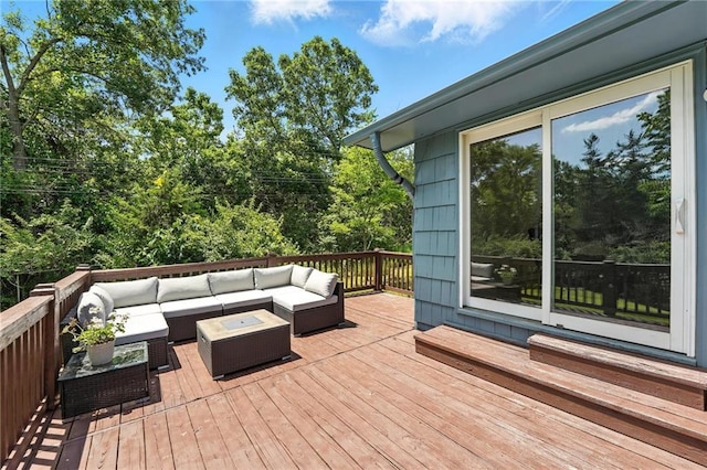 2903 E 107th Ter, Kansas City, MO 64137 - wooden terrace with outdoor lounge area