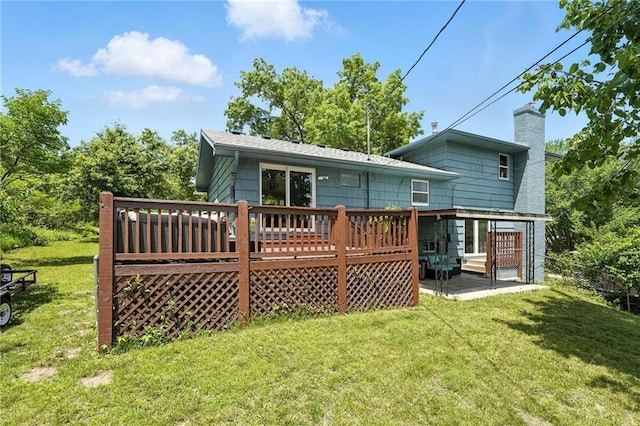 2903 E 107th Ter, Kansas City, MO 64137 - back of house with a deck and a chimney