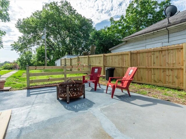 915 N 24th St, Saint Joseph, MO 64506 - view of patio / terrace with a fire pit