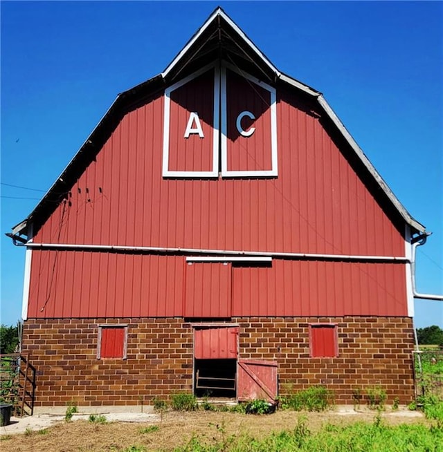 18400 Keitel Rd, Parker, KS 66072 - view of side of home with a barn and an outbuilding