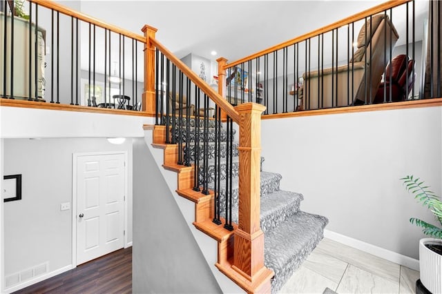 33383 Acorn Ln, Warsaw, MO 65355 - stairs with baseboards and recessed lighting