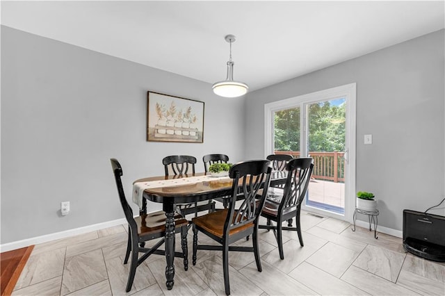 33383 Acorn Ln, Warsaw, MO 65355 - dining room featuring baseboards
