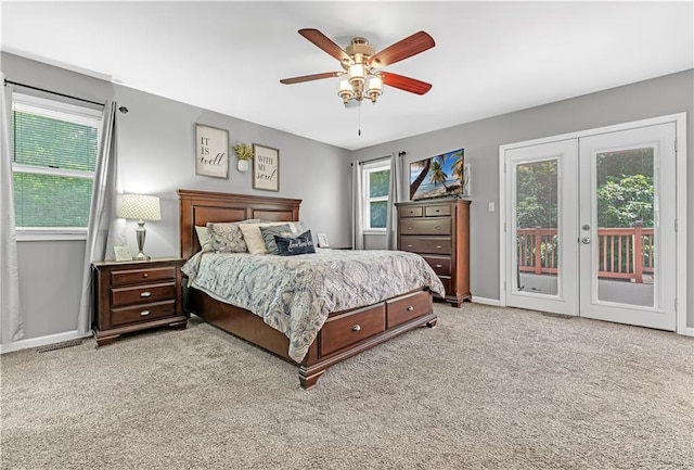 33383 Acorn Ln, Warsaw, MO 65355 - bedroom with access to exterior, french doors, light colored carpet, and a ceiling fan