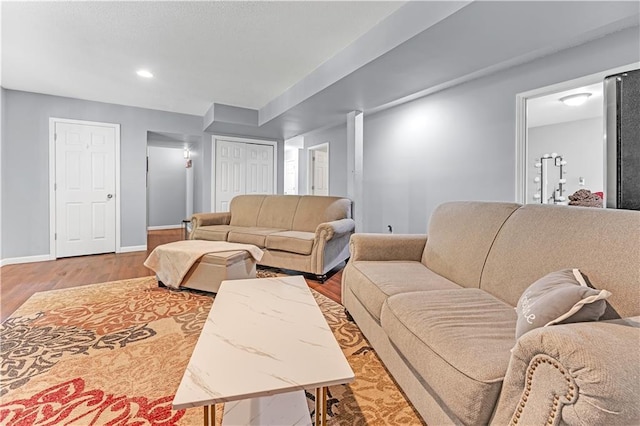 33383 Acorn Ln, Warsaw, MO 65355 - living area featuring wood finished floors and baseboards