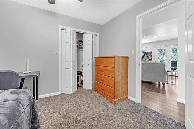 33383 Acorn Ln, Warsaw, MO 65355 - bedroom with french doors, carpet, a closet, and a ceiling fan
