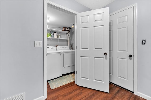 33383 Acorn Ln, Warsaw, MO 65355 - laundry room with washer and clothes dryer and dark wood-style floors