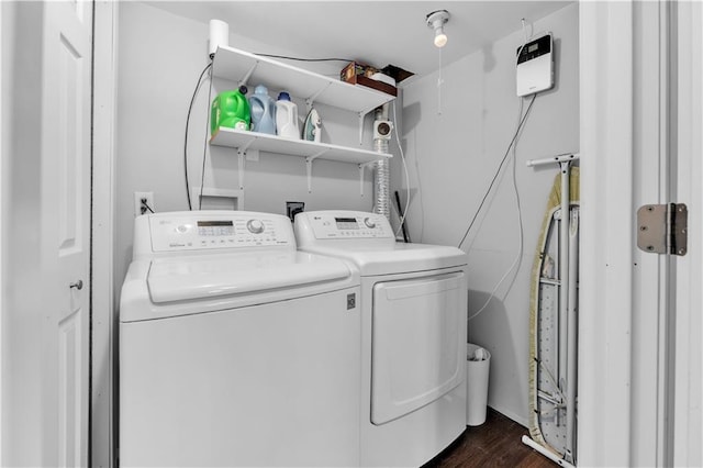 33383 Acorn Ln, Warsaw, MO 65355 - laundry area with washer and dryer and dark wood-style flooring