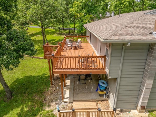 33383 Acorn Ln, Warsaw, MO 65355 - wooden deck with outdoor dining space, a yard, and a patio area
