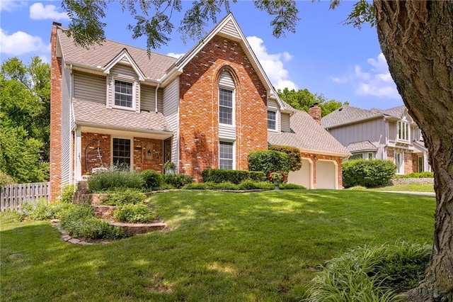 11530 Hemlock St, Overland Park, KS 66210 - traditional-style home with brick siding, a garage, a chimney, and a shingled roof