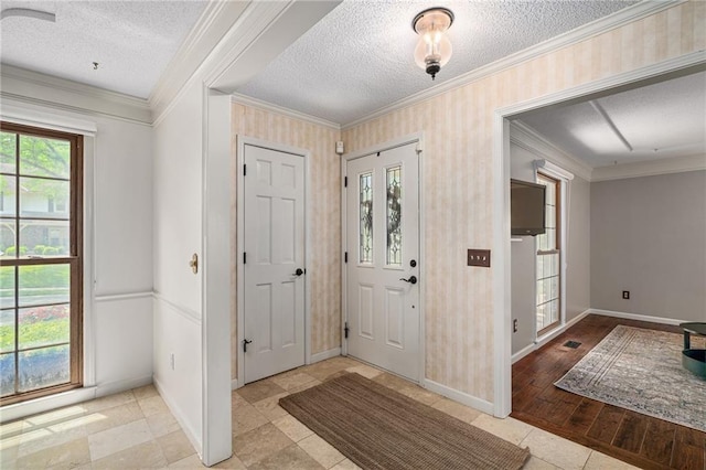 11530 Hemlock St, Overland Park, KS 66210 - entryway with a textured ceiling and crown molding