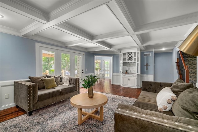11530 Hemlock St, Overland Park, KS 66210 - living area featuring dark wood-style flooring, beamed ceiling, coffered ceiling, ornamental molding, and stairway