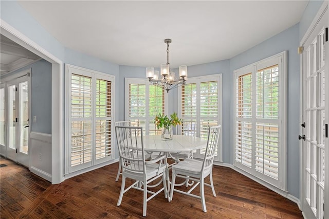 11530 Hemlock St, Overland Park, KS 66210 - dining space with a chandelier, plenty of natural light, and dark wood-style floors