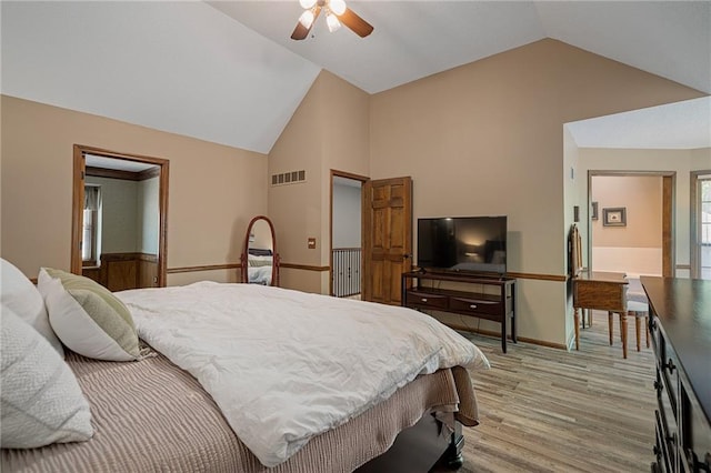 11530 Hemlock St, Overland Park, KS 66210 - bedroom with lofted ceiling, light wood-style floors, and a ceiling fan