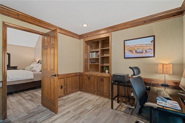 11530 Hemlock St, Overland Park, KS 66210 - office with light wood-style floors, a textured ceiling, wainscoting, crown molding, and built in features