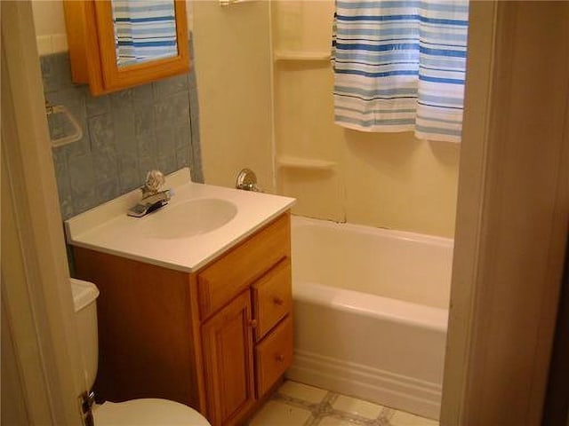 482 Fieldcrest Dr, Pittsburg, KS 66762 - full bathroom featuring vanity and  shower combination
