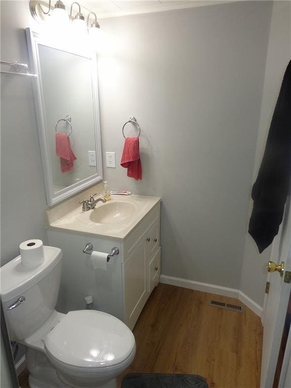 482 Fieldcrest Dr, Pittsburg, KS 66762 - half bath with wood finished floors and vanity