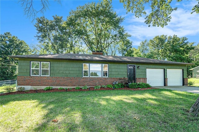 2110 N 70th Ter, Kansas City, KS 66109 - view of front of home with brick siding, an attached garage, driveway, and a chimney