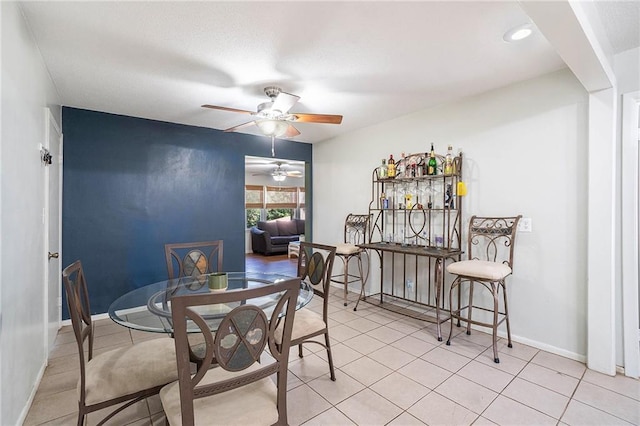 2110 N 70th Ter, Kansas City, KS 66109 - dining room featuring ceiling fan and light tile patterned floors