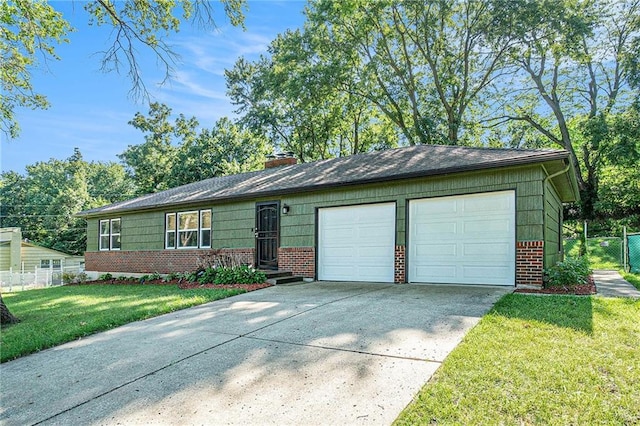 2110 N 70th Ter, Kansas City, KS 66109 - view of front of property featuring brick siding, driveway, an attached garage, and a chimney