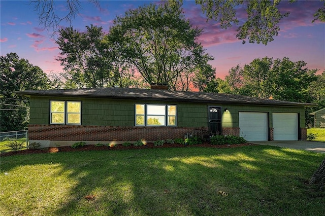 2110 N 70th Ter, Kansas City, KS 66109 - ranch-style home with brick siding, an attached garage, driveway, and a chimney