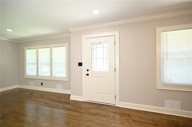 6309 E 102nd Ter, Kansas City, MO 64134 - foyer with crown molding, dark wood-style floors, healthy amount of natural light, and recessed lighting