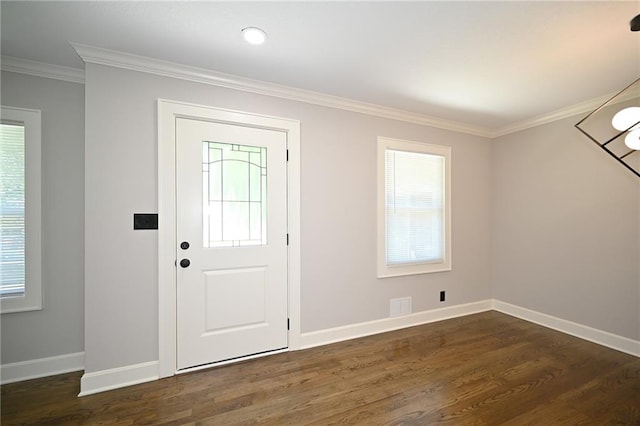 6309 E 102nd Ter, Kansas City, MO 64134 - foyer featuring crown molding and dark wood-style flooring