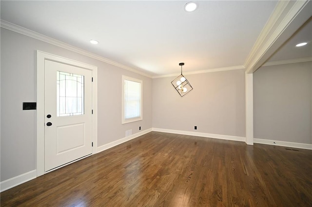 6309 E 102nd Ter, Kansas City, MO 64134 - entrance foyer with ornamental molding, dark wood finished floors, and recessed lighting