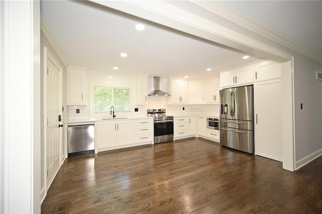 6309 E 102nd Ter, Kansas City, MO 64134 - kitchen featuring stainless steel appliances, wall chimney range hood, ornamental molding, light countertops, and dark wood finished floors