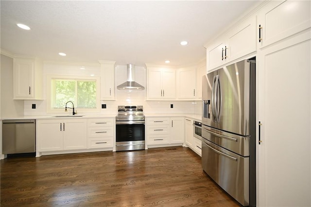 6309 E 102nd Ter, Kansas City, MO 64134 - kitchen with appliances with stainless steel finishes, wall chimney range hood, white cabinets, backsplash, and light countertops
