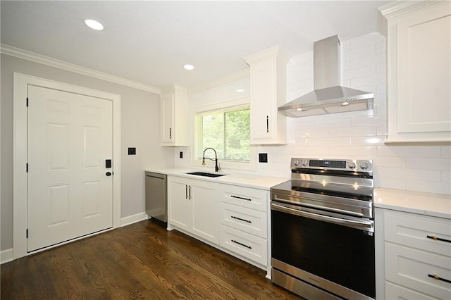 6309 E 102nd Ter, Kansas City, MO 64134 - kitchen featuring appliances with stainless steel finishes, wall chimney exhaust hood, backsplash, ornamental molding, and white cabinets