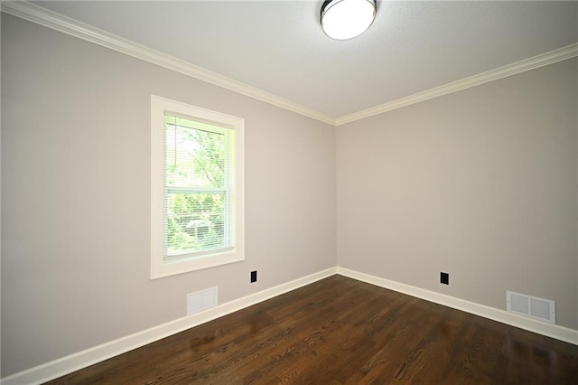 6309 E 102nd Ter, Kansas City, MO 64134 - spare room featuring ornamental molding and dark wood-style floors