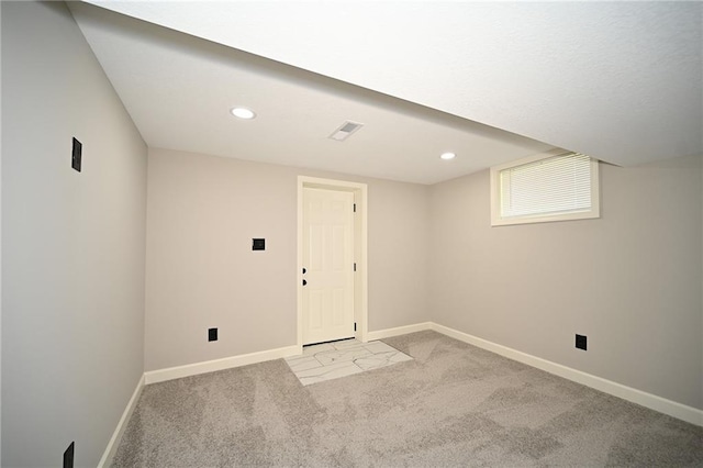 6309 E 102nd Ter, Kansas City, MO 64134 - spare room with light carpet and recessed lighting