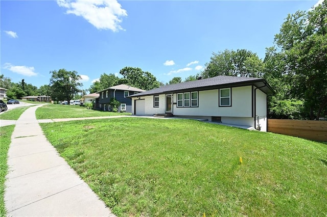 6309 E 102nd Ter, Kansas City, MO 64134 - view of front of property with a garage