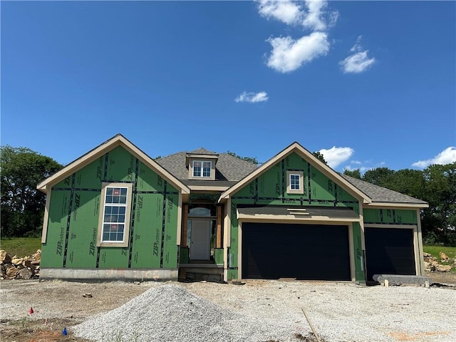 2108 SW Wheatfield Dr, Lees Summit, MO 64082 - unfinished property with an attached garage, driveway, and roof with shingles