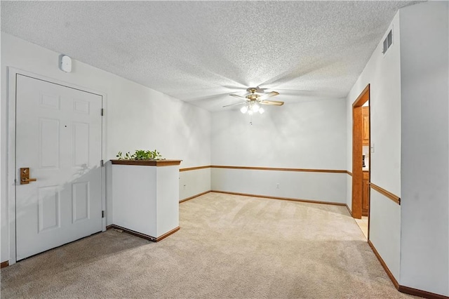 8001 Westridge Rd Unit 103, Raytown, MO 64138 - carpeted empty room with ceiling fan and a textured ceiling