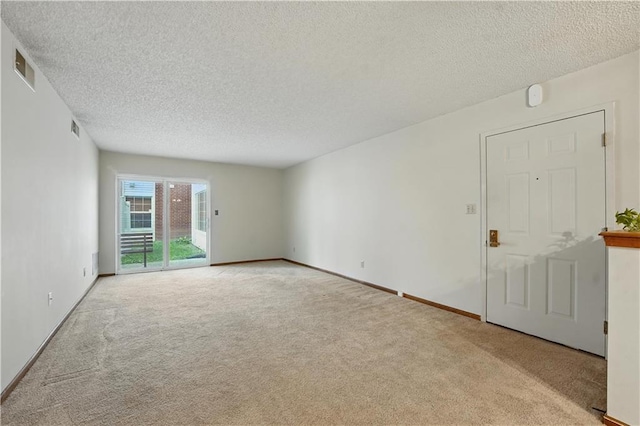 8001 Westridge Rd Unit 103, Raytown, MO 64138 - empty room with carpet and a textured ceiling