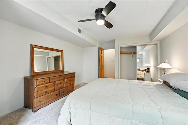 8001 Westridge Rd Unit 103, Raytown, MO 64138 - bedroom featuring light carpet, a closet, and a ceiling fan