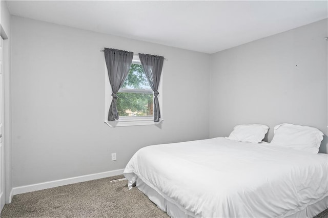 16722 E 35th Ter, Independence, MO 64055 - bedroom with baseboards and carpet floors
