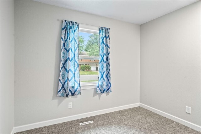 16722 E 35th Ter, Independence, MO 64055 - empty room with baseboards and carpet