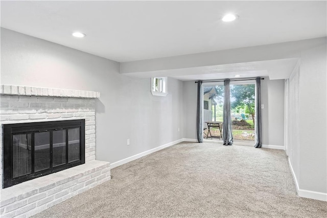 16722 E 35th Ter, Independence, MO 64055 - unfurnished living room featuring carpet flooring, a fireplace, and recessed lighting