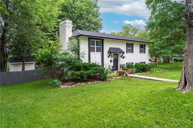 16722 E 35th Ter, Independence, MO 64055 - raised ranch with a chimney and brick siding