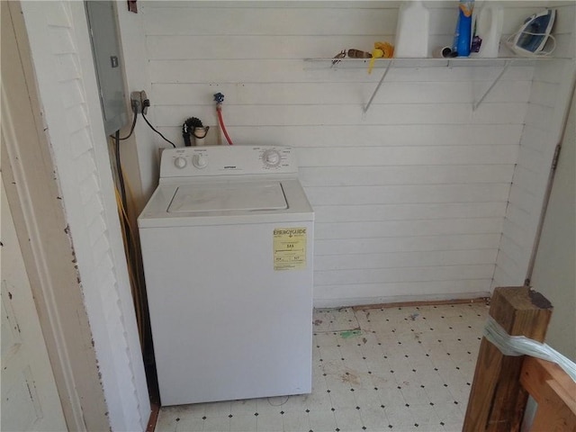 1918 S Elm St, Pittsburg, KS 66762 - laundry room with washer / clothes dryer, tile patterned floors, electric panel, and wood walls