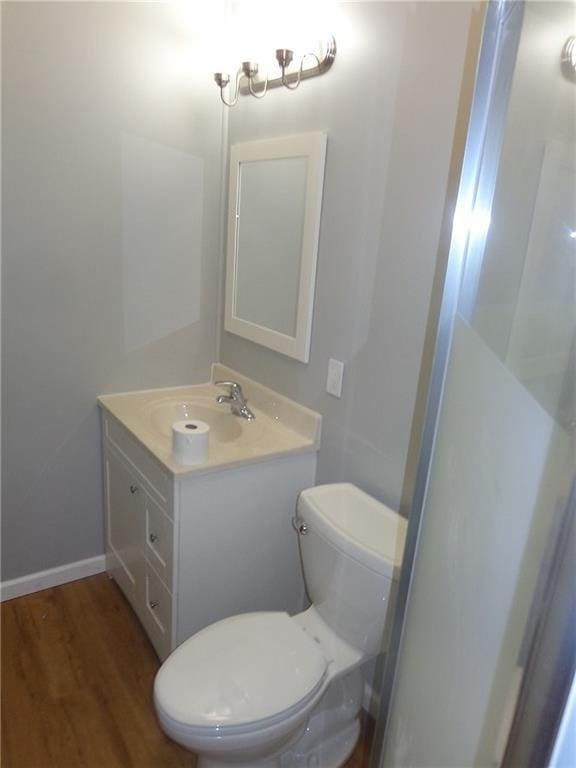 1918 S Elm St, Pittsburg, KS 66762 - bathroom with vanity and wood finished floors