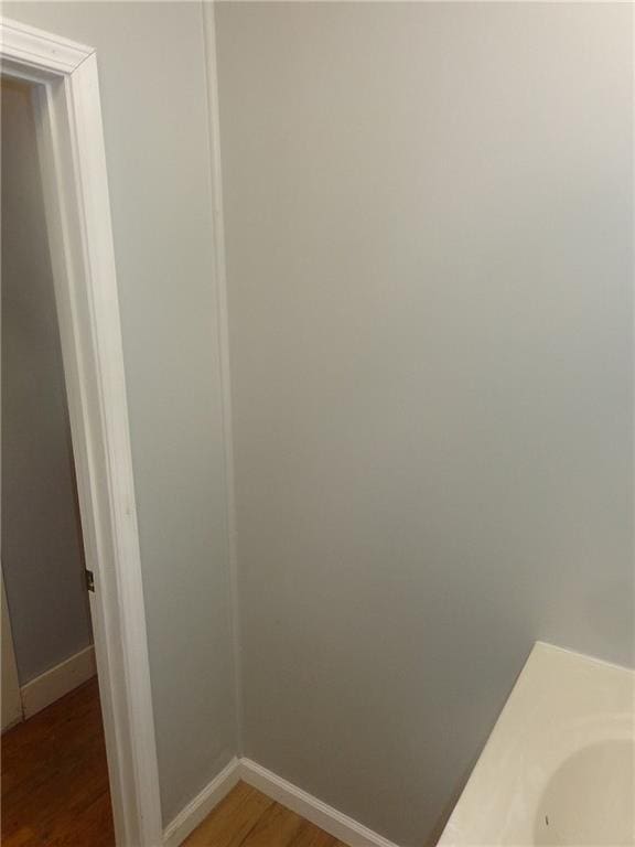 1918 S Elm St, Pittsburg, KS 66762 - bathroom featuring wood finished floors and vanity