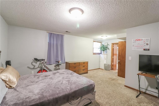 304 NE Independence Ave Unit B, Lees Summit, MO 64063 - bedroom featuring a textured ceiling and light colored carpet