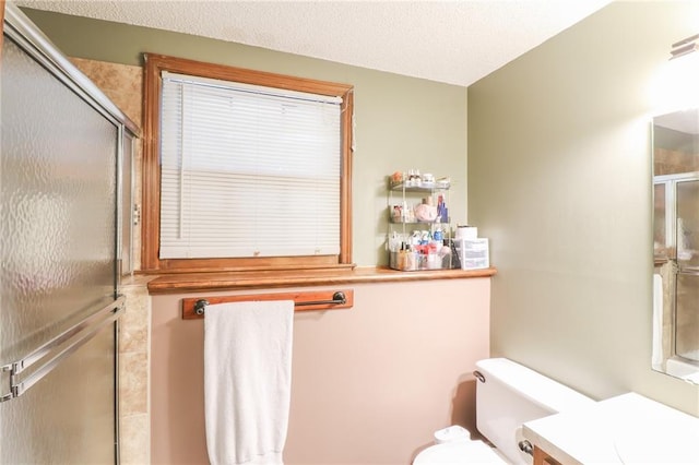 304 NE Independence Ave Unit B, Lees Summit, MO 64063 - bathroom with a shower with door and vanity