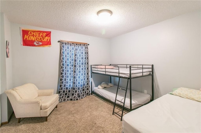 304 NE Independence Ave Unit B, Lees Summit, MO 64063 - bedroom featuring carpet flooring and a textured ceiling
