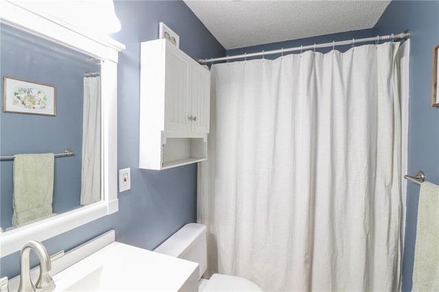 304 NE Independence Ave Unit B, Lees Summit, MO 64063 - bathroom featuring vanity, a textured ceiling, and a shower with curtain