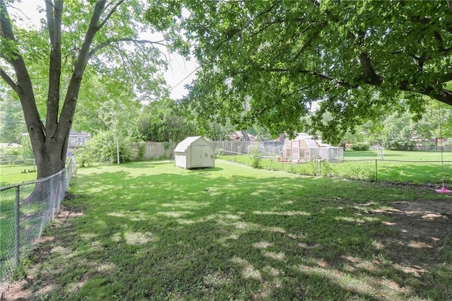 304 NE Independence Ave Unit B, Lees Summit, MO 64063 - fenced backyard with a storage shed
