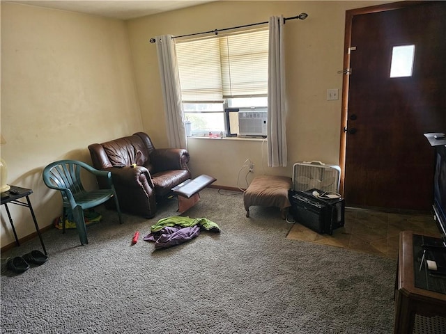 524 E Walnut St, Independence, MO 64050 - carpeted living room with cooling unit and plenty of natural light